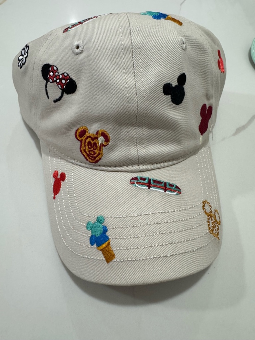Disney Cream Baseball Cap with Black Logo and Gold Embroidery